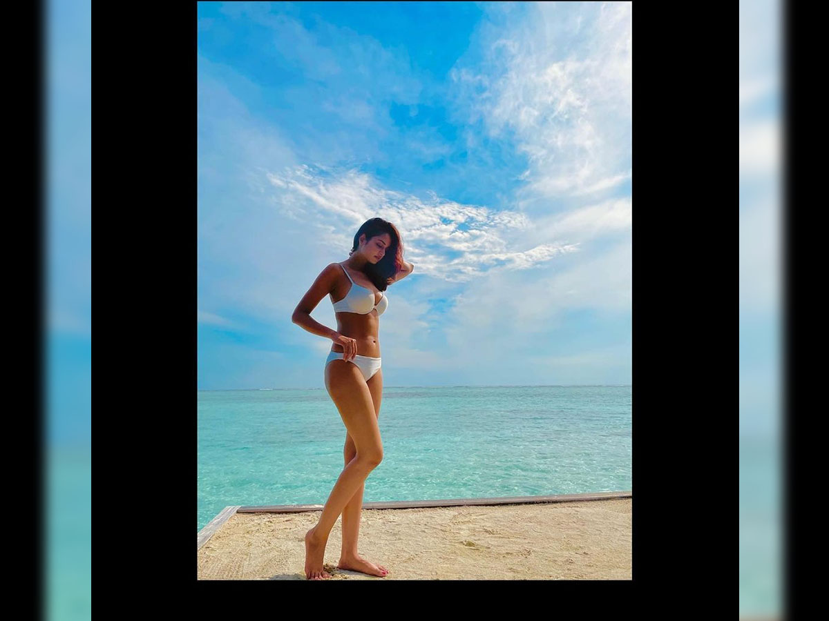 Enjoying sea-facing view in bikini