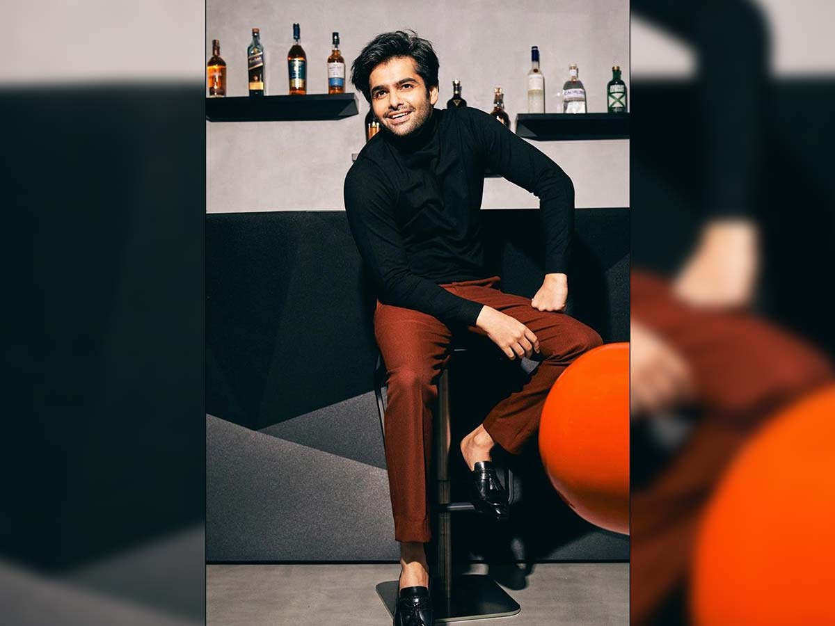 Ram Pothineni with wine bottles