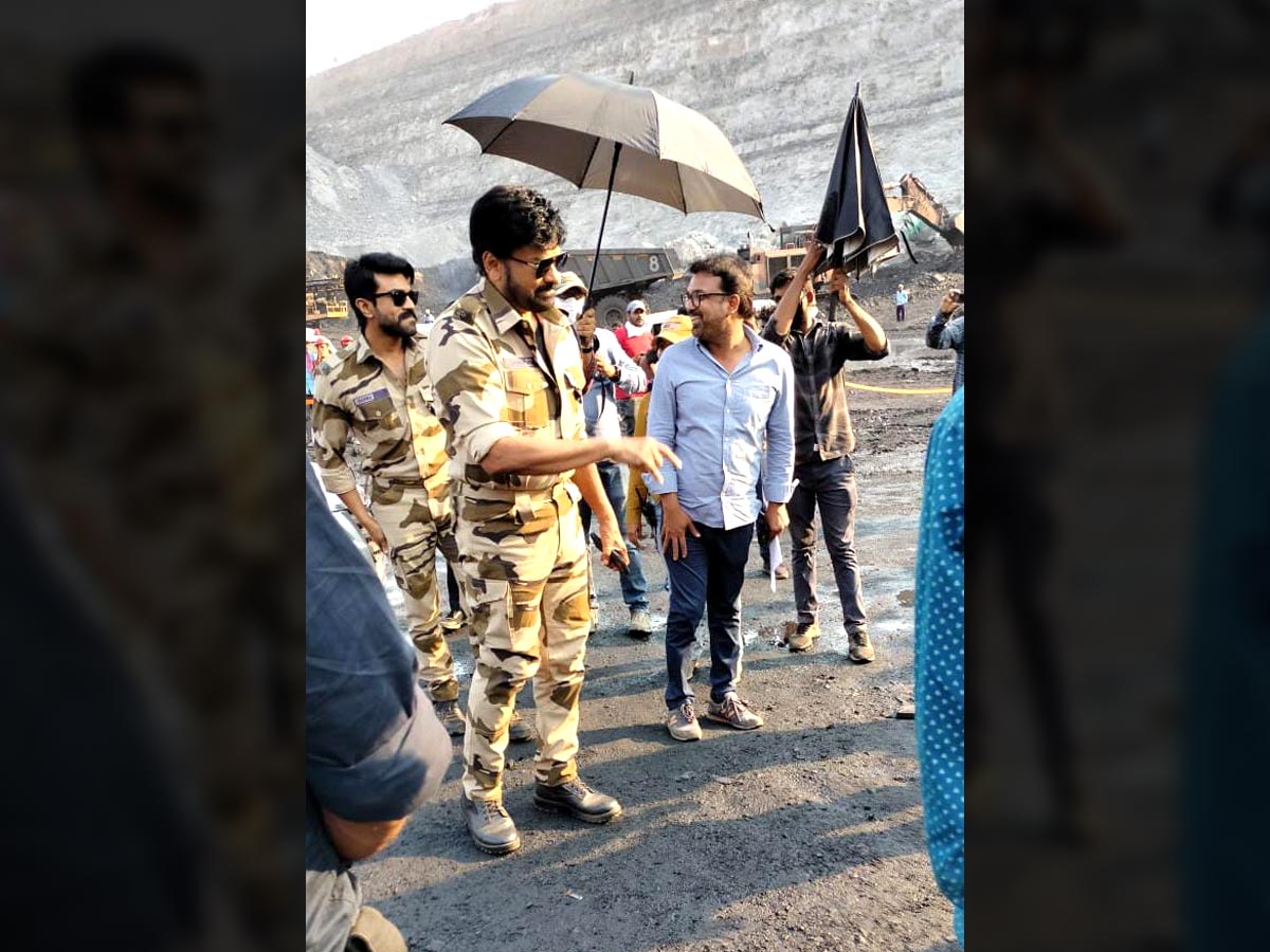 Acharya Ram Charan and Chiranjeevi in military attire